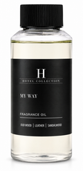 A bottle of Hotel Collection 'My Way' fragrance oil with a black cap and a black label, showing a pale yellow liquid inside, on a white background.