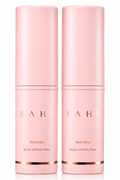 Two pink skincare bottles labeled 'Kahi' on a white background