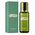 La Mer treatment lotion bottle and packaging on a white background