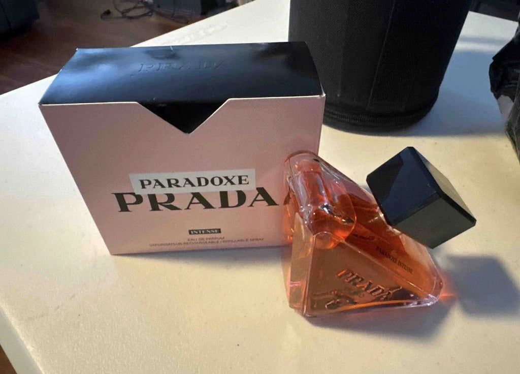 Prada Paradoxe perfume bottle and packaging on a table