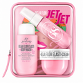 Pink travel set with 'Beja Flor' products including body wash and cream in a clear case.